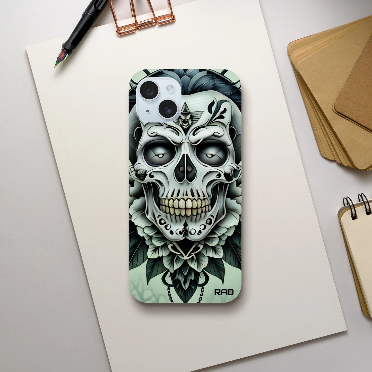 Phone case with skull design on a white surface