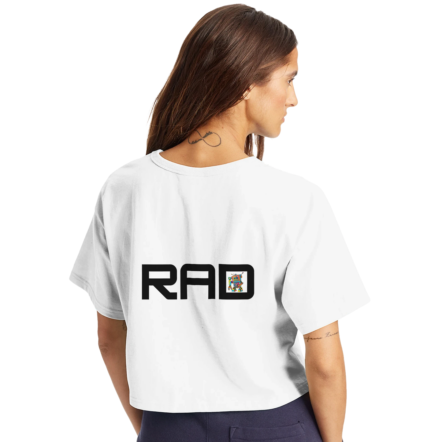 Woman wearing a white t-shirt with 'RAD' printed on the back against a white background