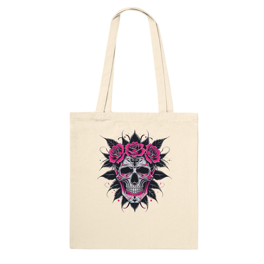 Beige tote bag with a skull and roses design on a white background