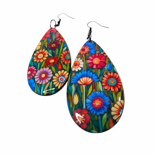 Large teardrop shaped wood earrings with colourful flowers design