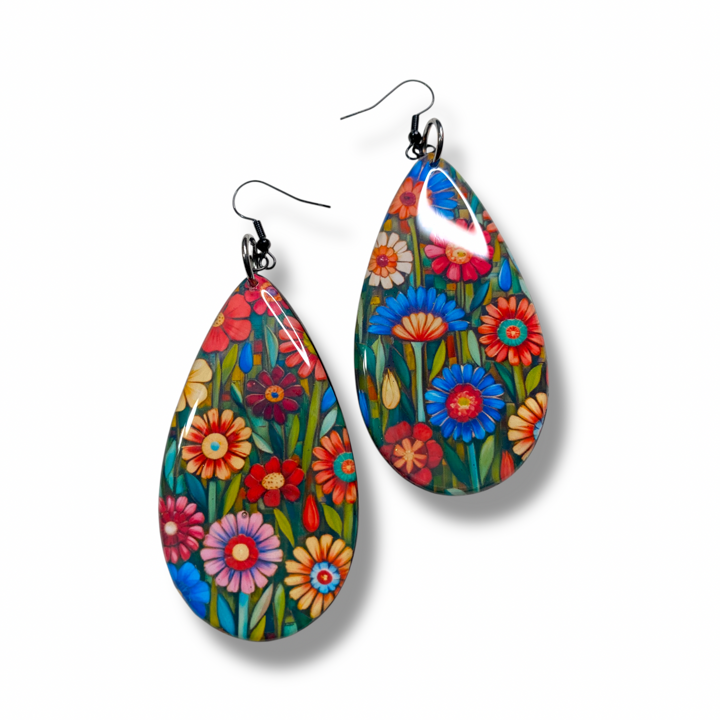 Large teardrop shaped wood earrings with colourful flowers design