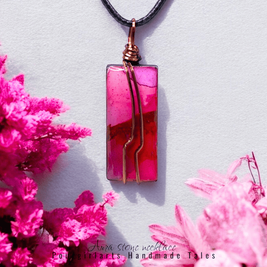 Pink pendant necklace with a floral background