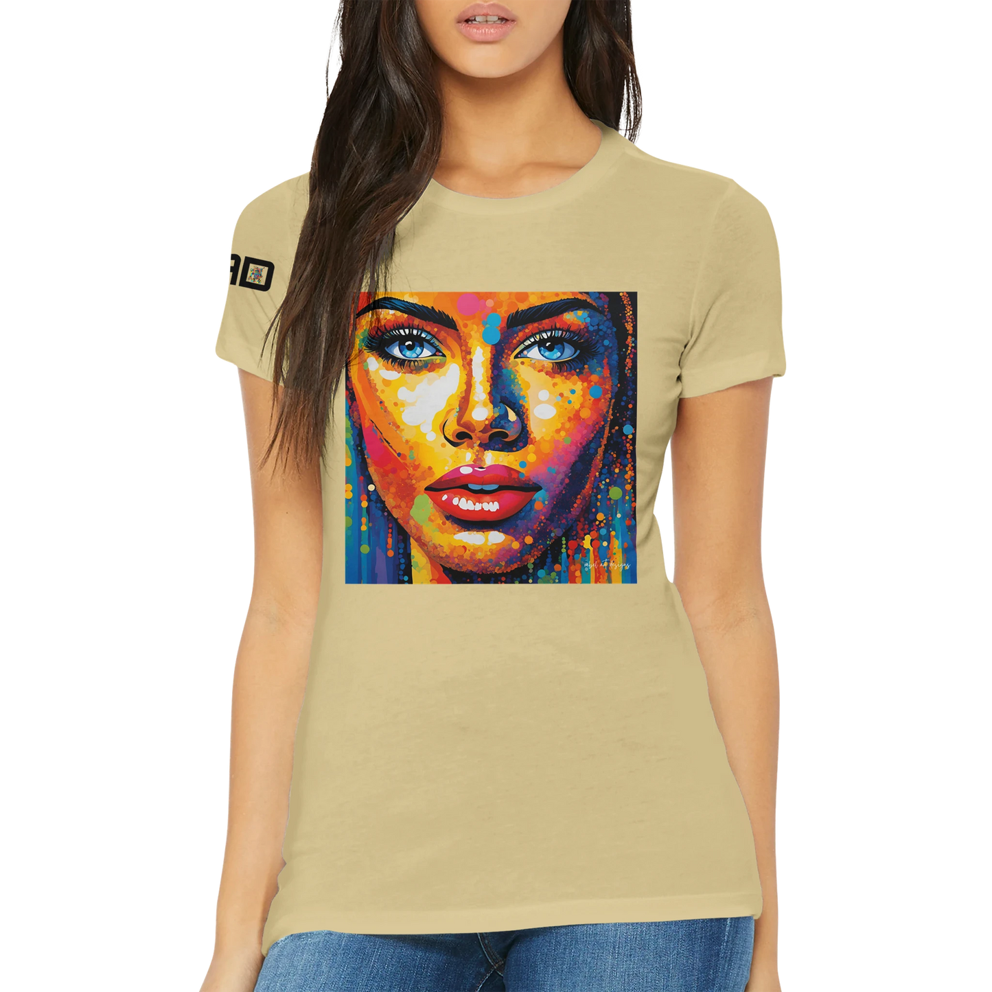 Woman wearing a beige t-shirt with a colorful graphic of a face on a white background