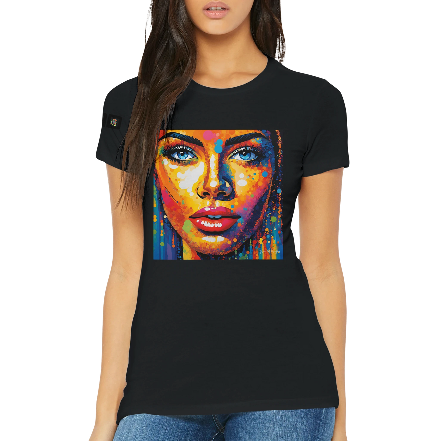 Black t-shirt with a colorful face design worn by a person on a white background