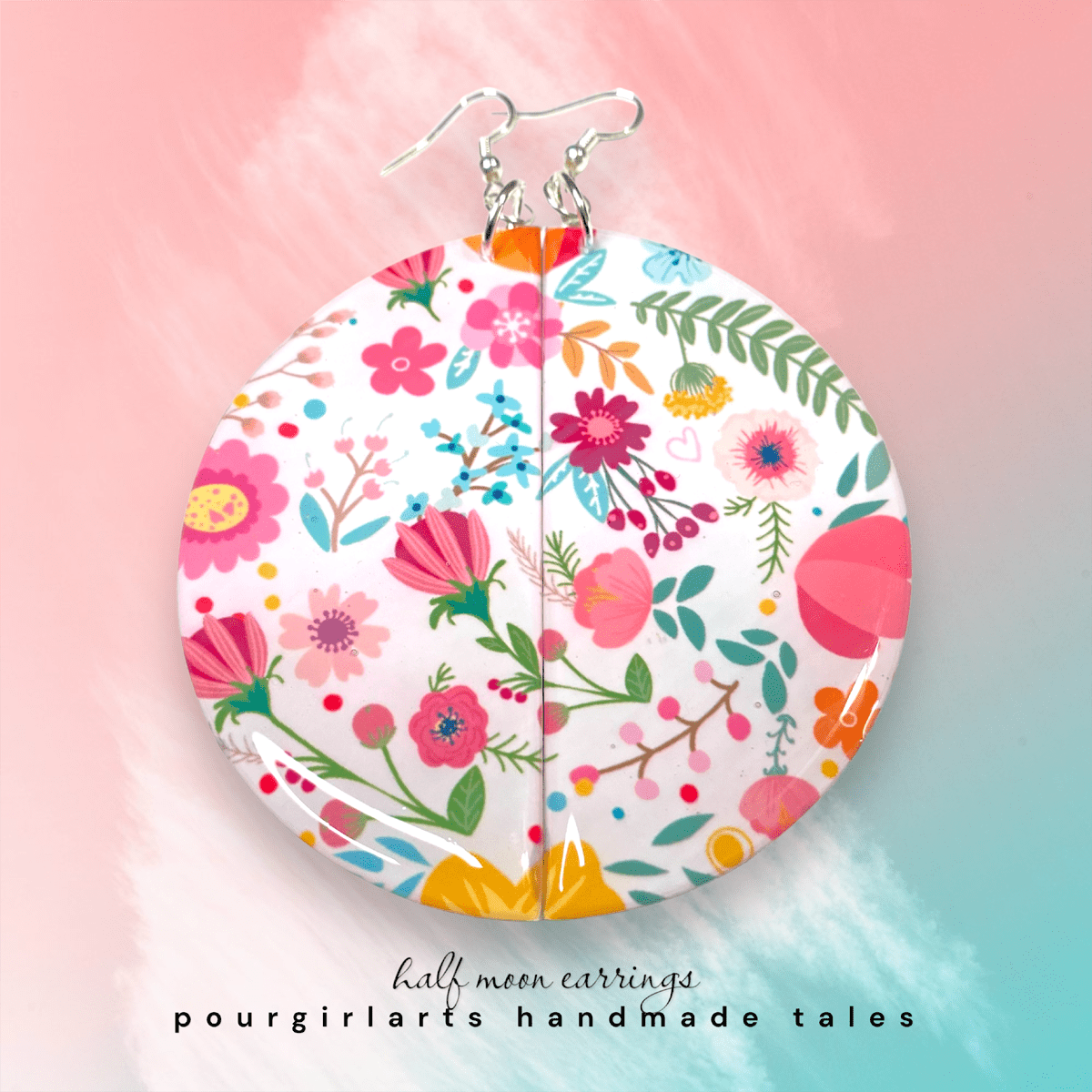 Floral half-moon earrings on a pink and blue gradient background with 'pourgirlarts handmade tales' text.
