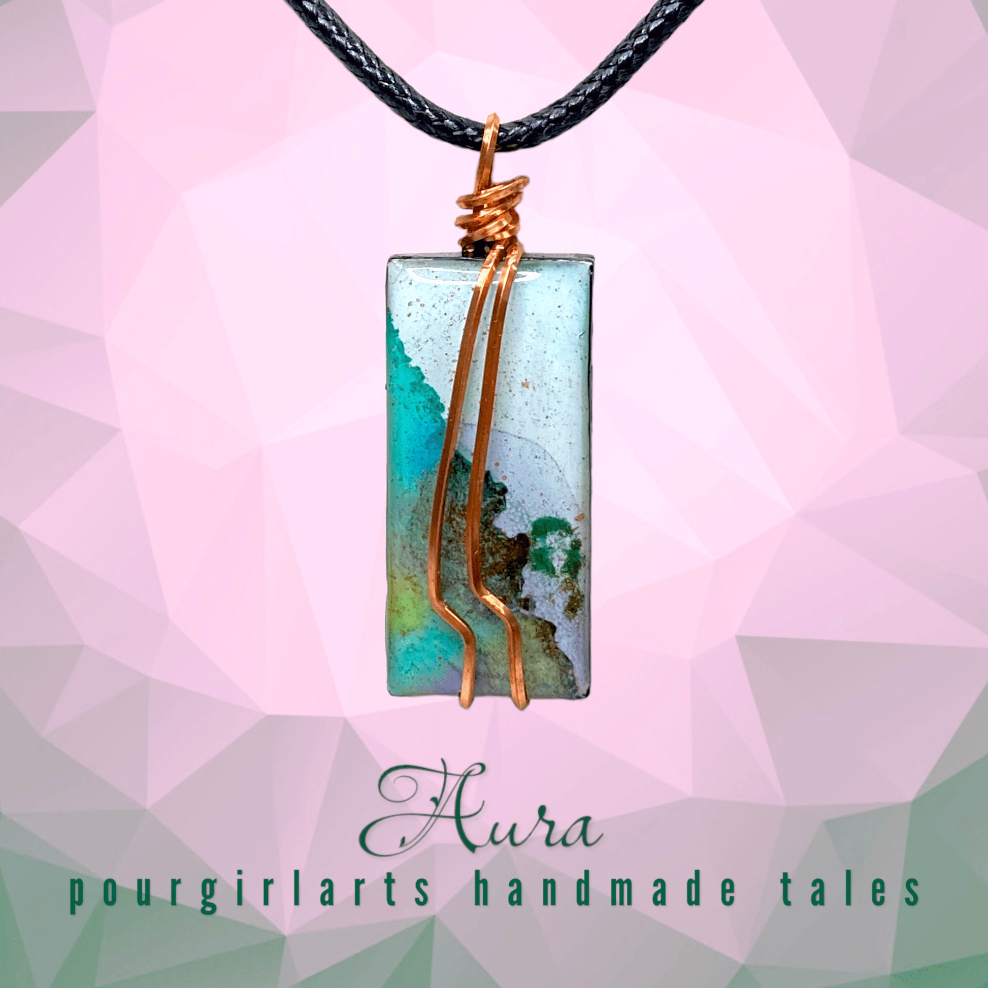 Necklace with a rectangular pendant featuring a copper wire on a pink geometric background, with 'Aura pourgirlarts handmade tales' text.
