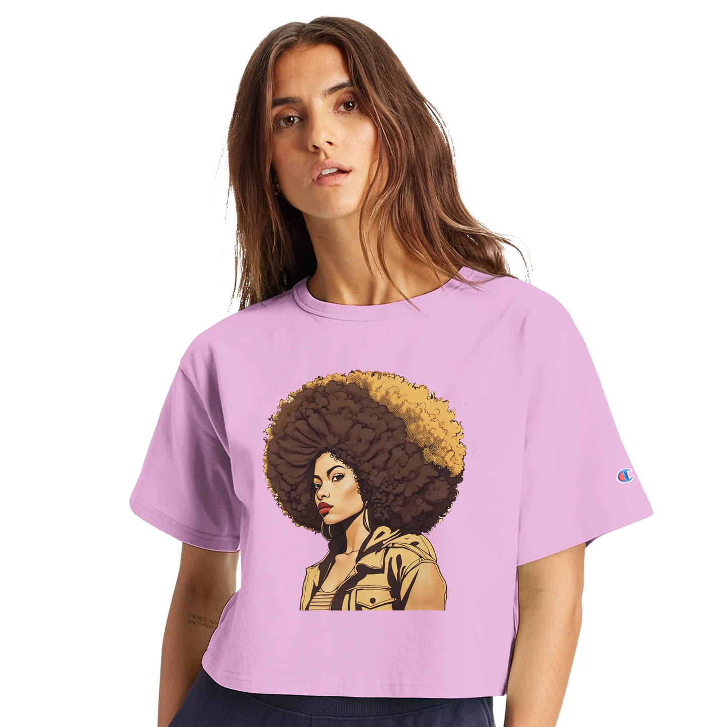 Woman wearing a purple t-shirt with a graphic design of a woman with an afro on a white background