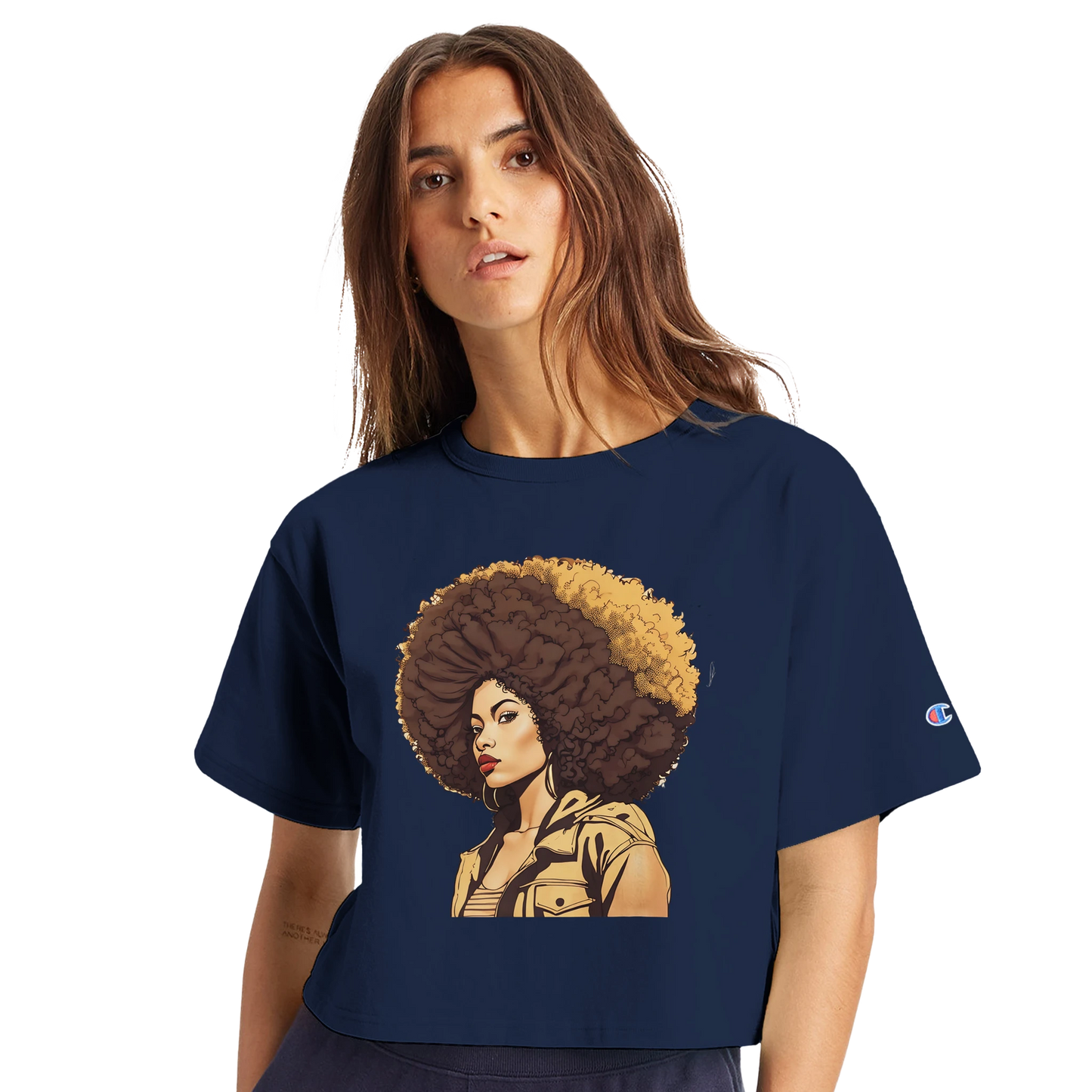 Woman wearing a navy blue t-shirt with a graphic design of a woman with an afro on a white background